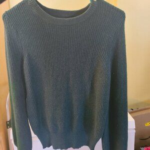 Green sweater with puffed sleeves